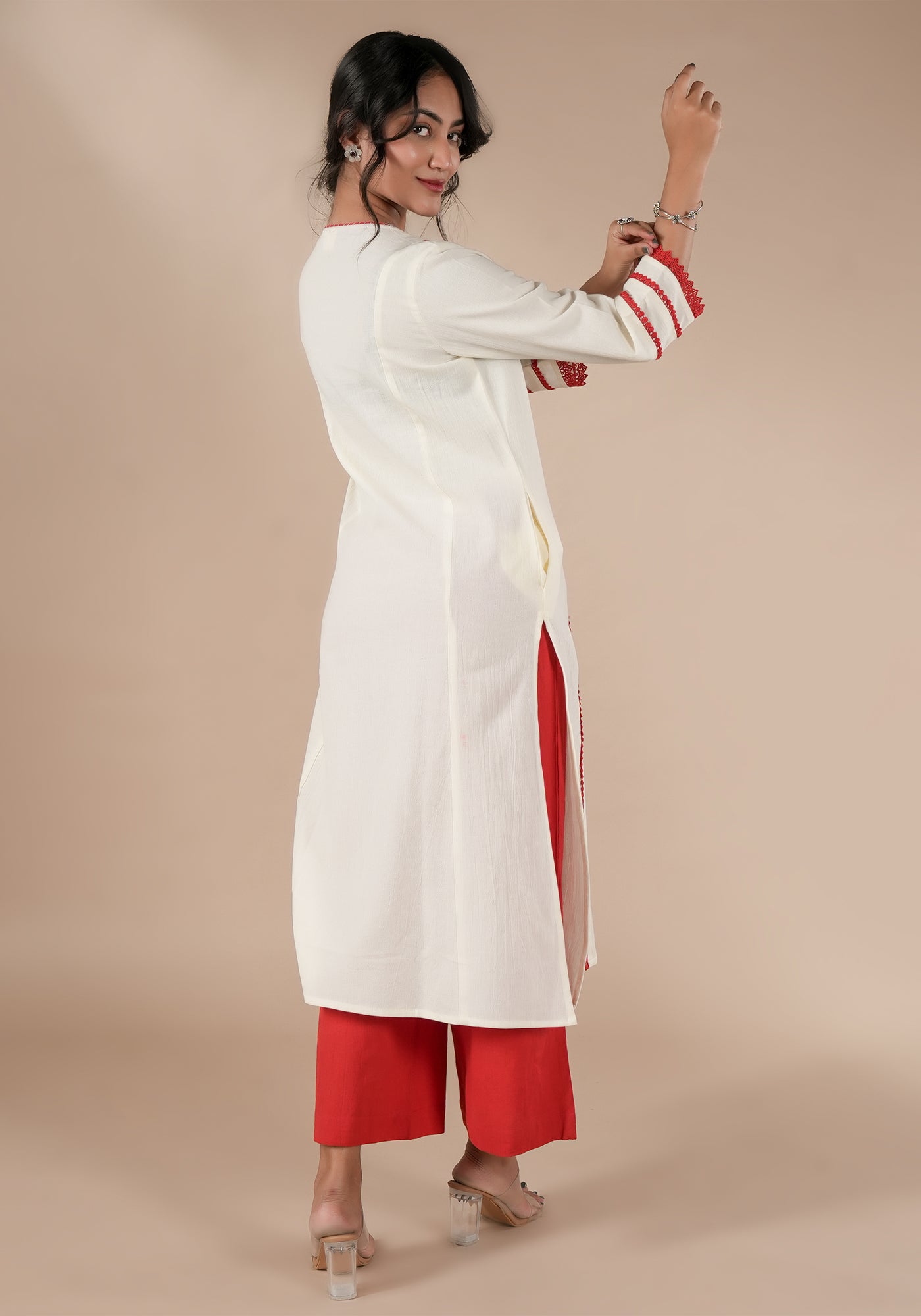 BINDU SOILD OFF WHITE KURTA WITH RED DETAILS