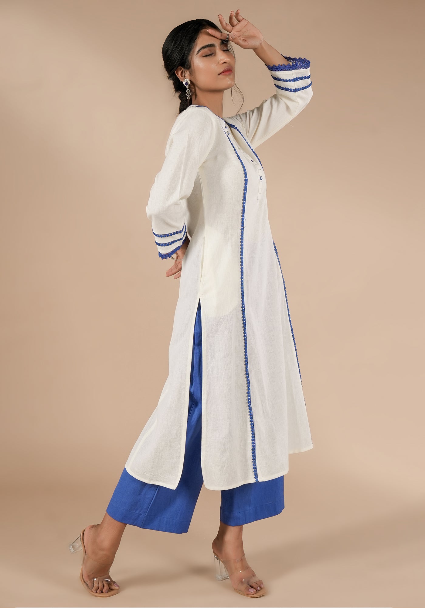 BINDU SOILD OFF WHITE KURTA WITH BLUE DETAILS