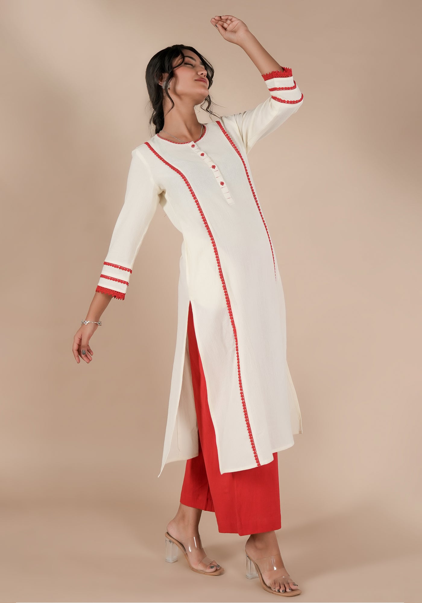 BINDU SOILD OFF WHITE KURTA WITH RED DETAILS