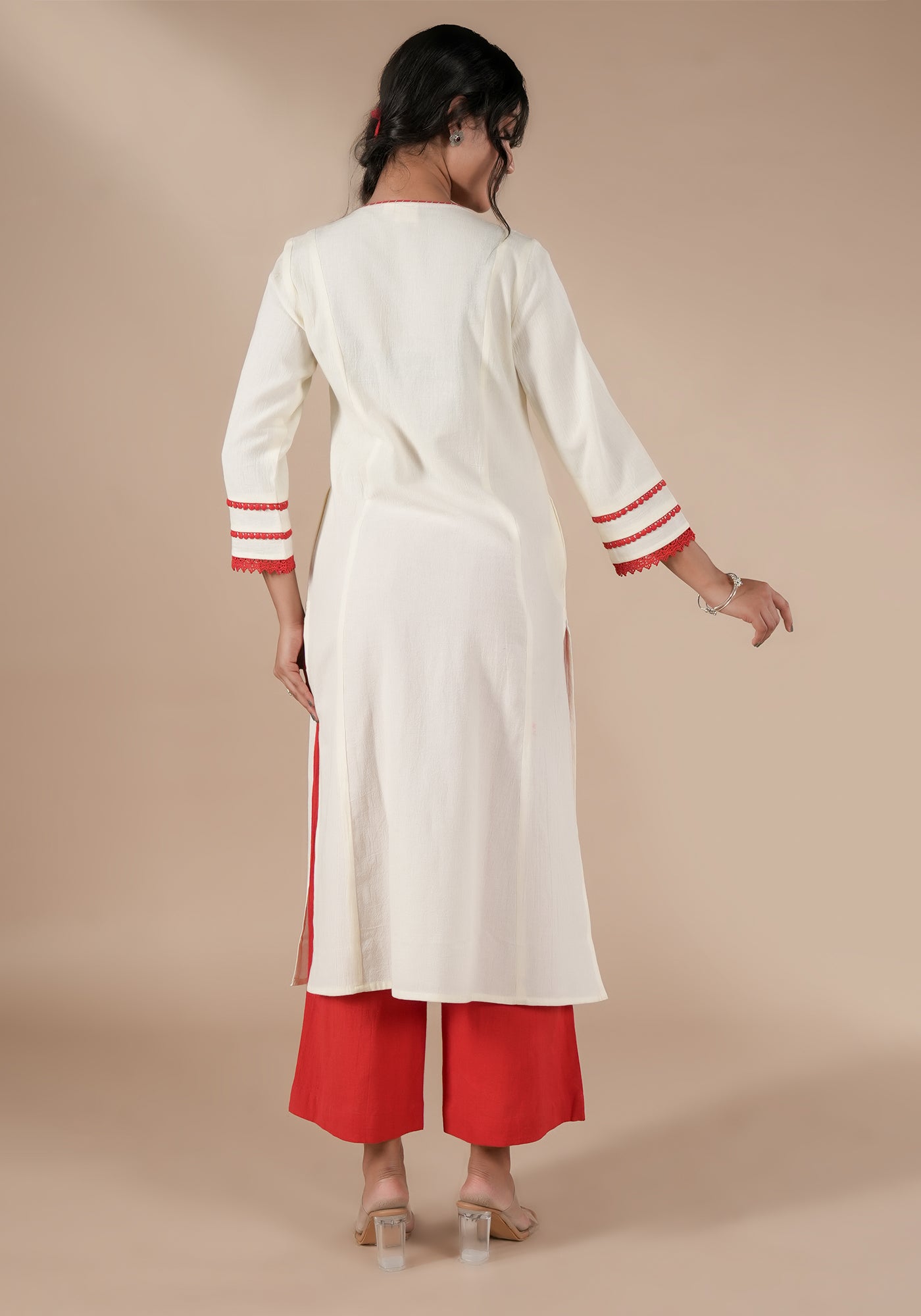 BINDU SOILD OFF WHITE KURTA WITH RED DETAILS
