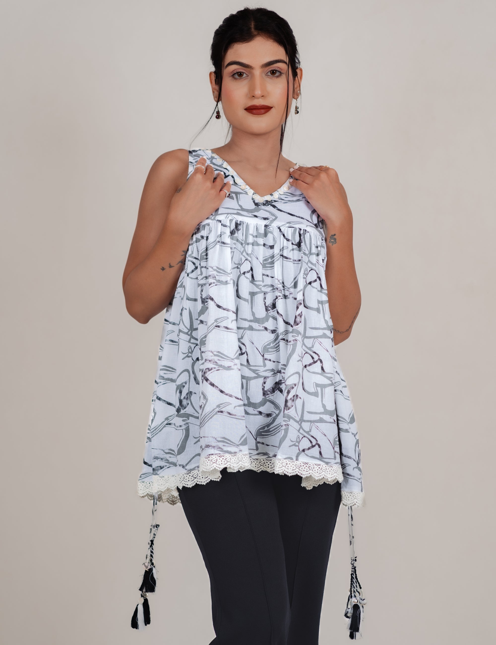 NITARA PRINTED TASSEL TOP