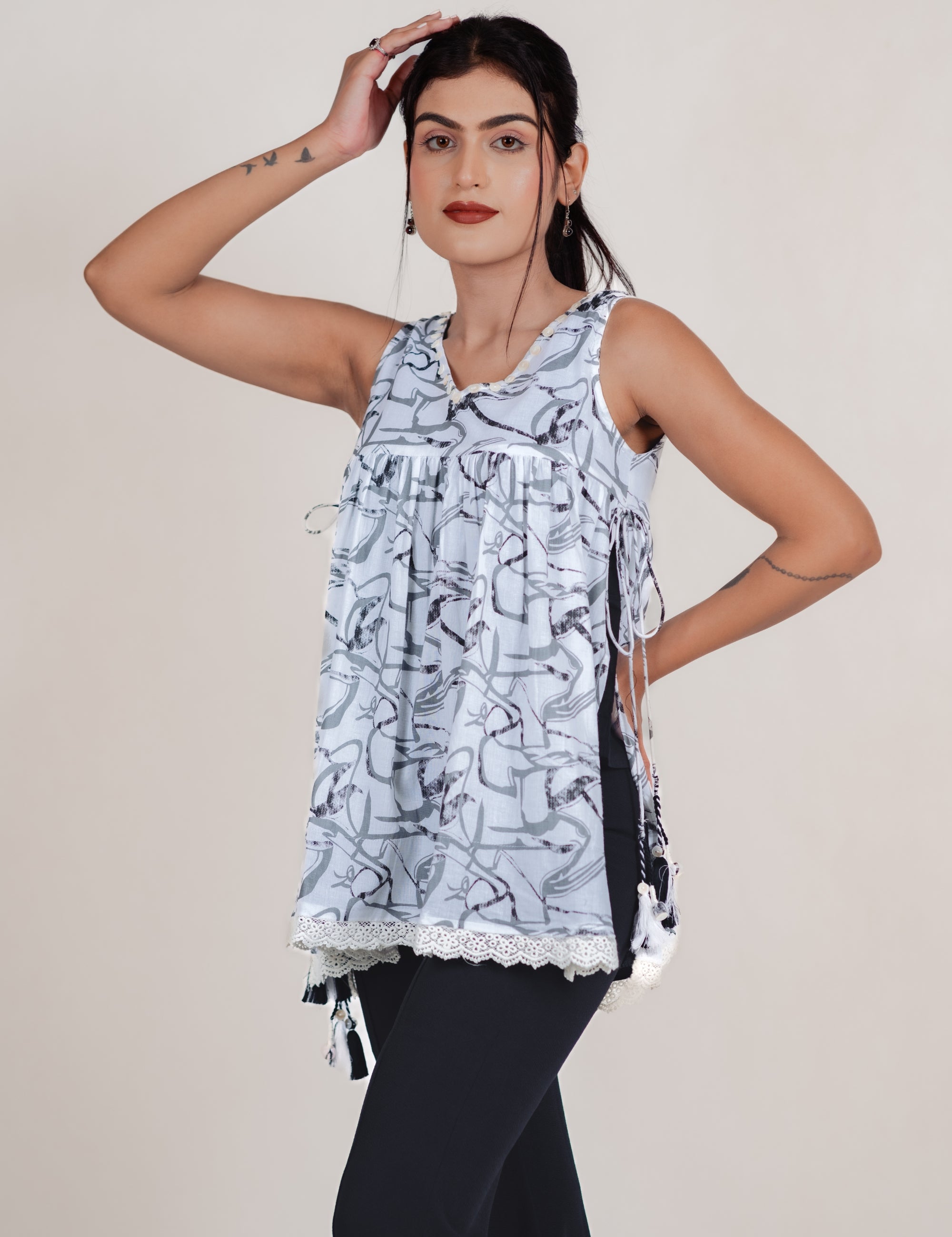 NITARA PRINTED TASSEL TOP