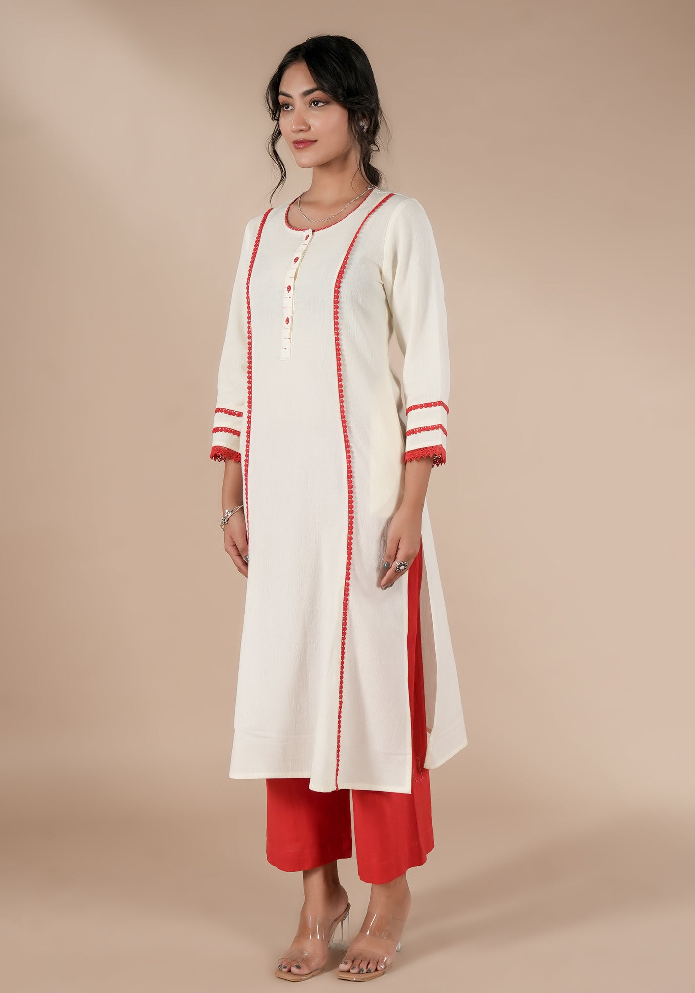 BINDU SOILD OFF WHITE KURTA WITH RED DETAILS
