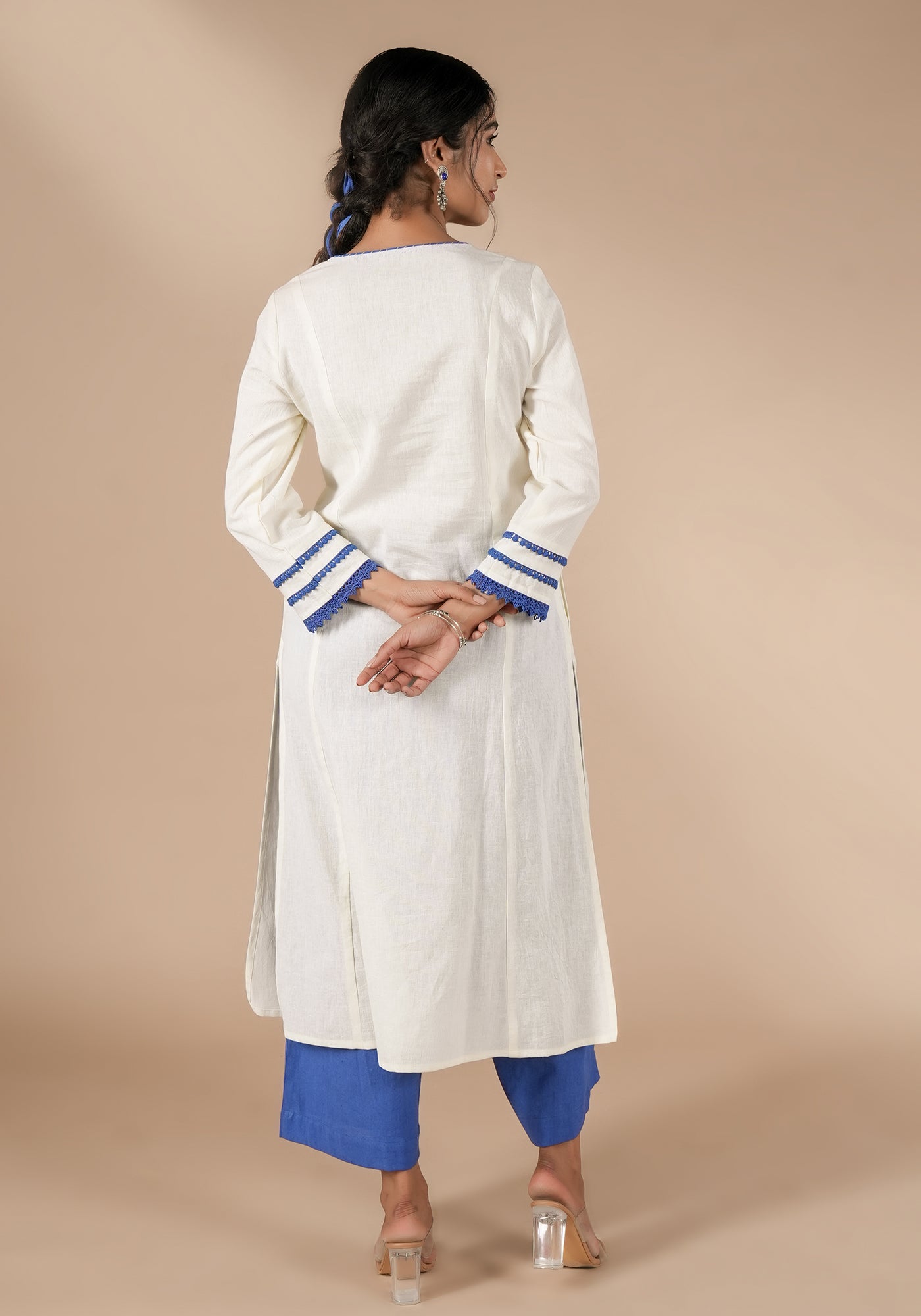 BINDU SOILD OFF WHITE KURTA WITH BLUE DETAILS